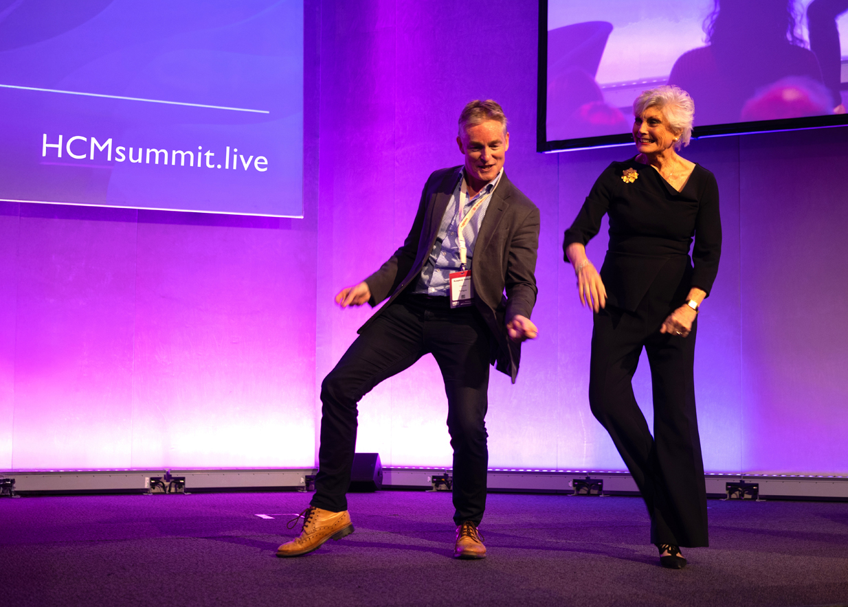 Summit chair Humphrey Cobbold joined Angela Rippon on stage to get delegates dancing